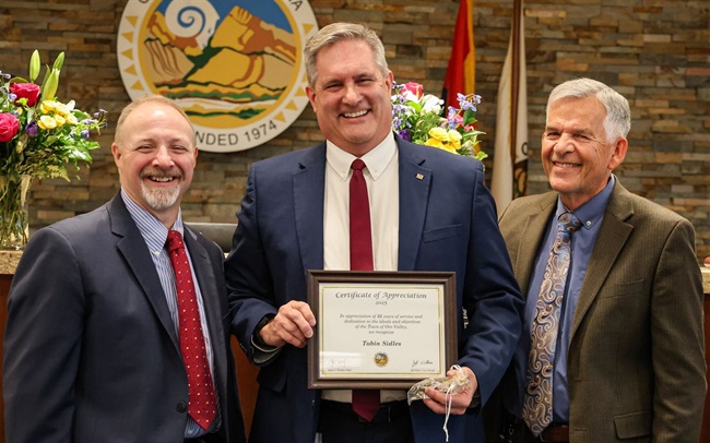 Tobin Sidles with Mayor and town manager_crop.jpg