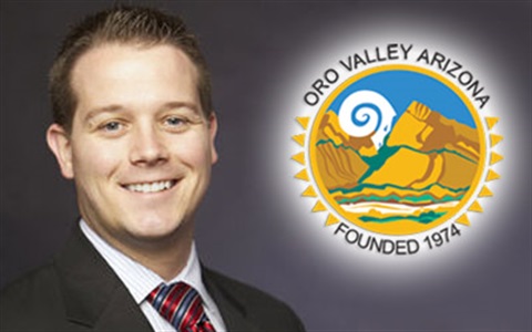 Photo of Chris Cornelison with Town Seal