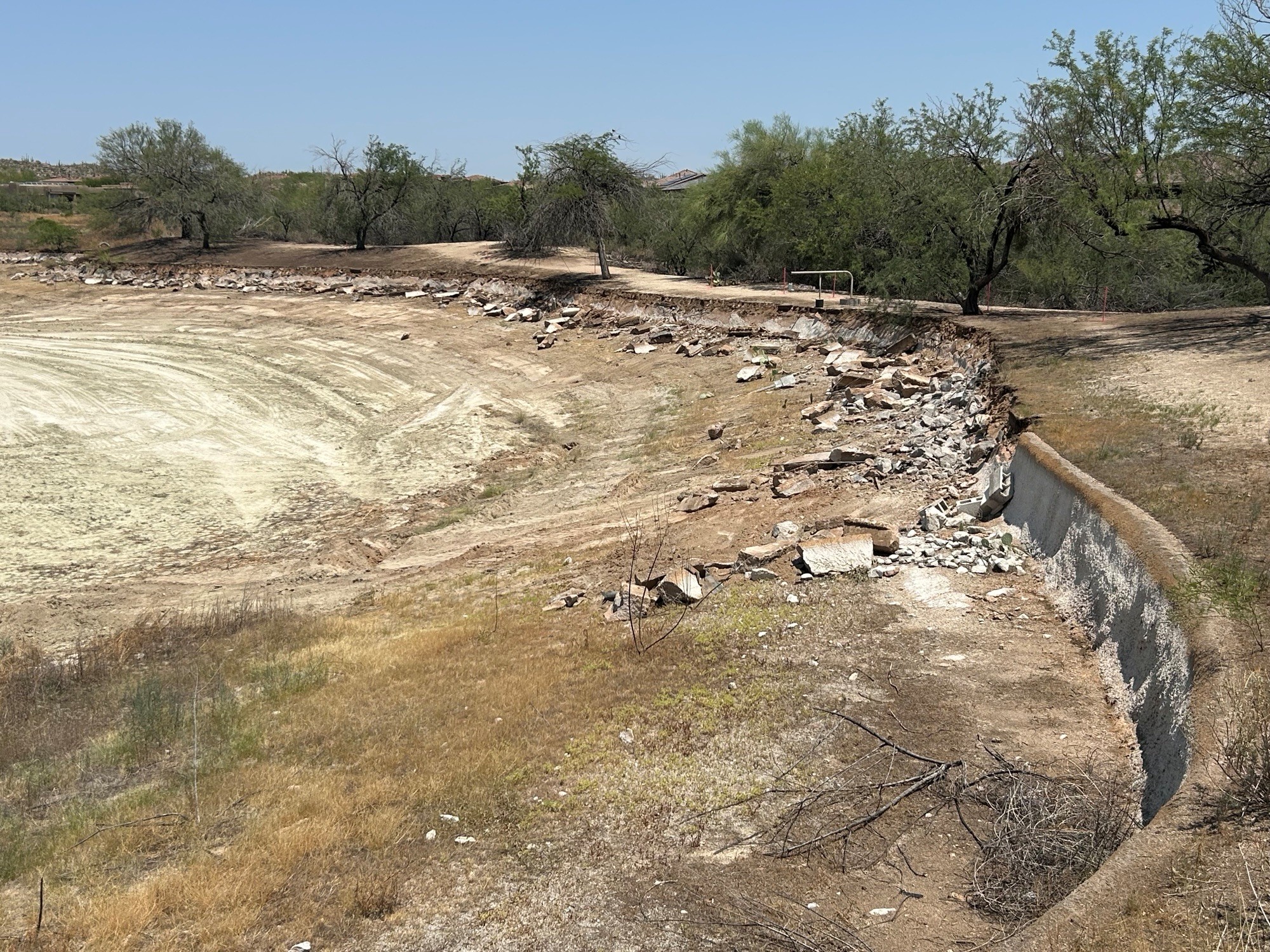 Bulkhead removal at Vistoso pond project