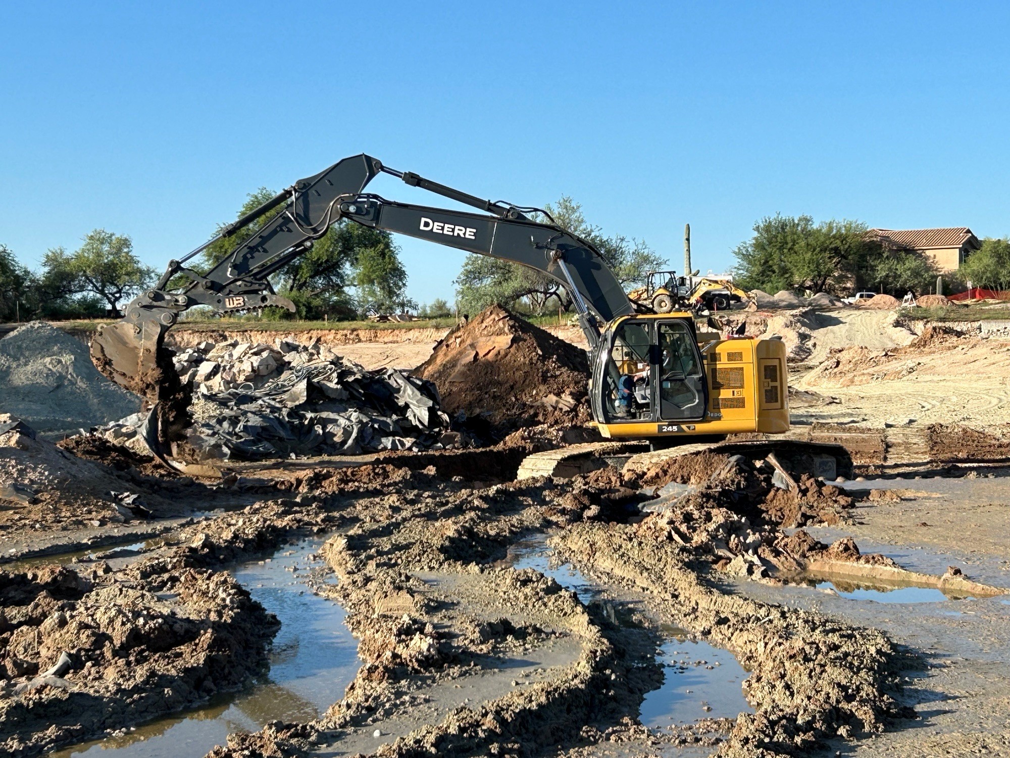 Grading work at the pond