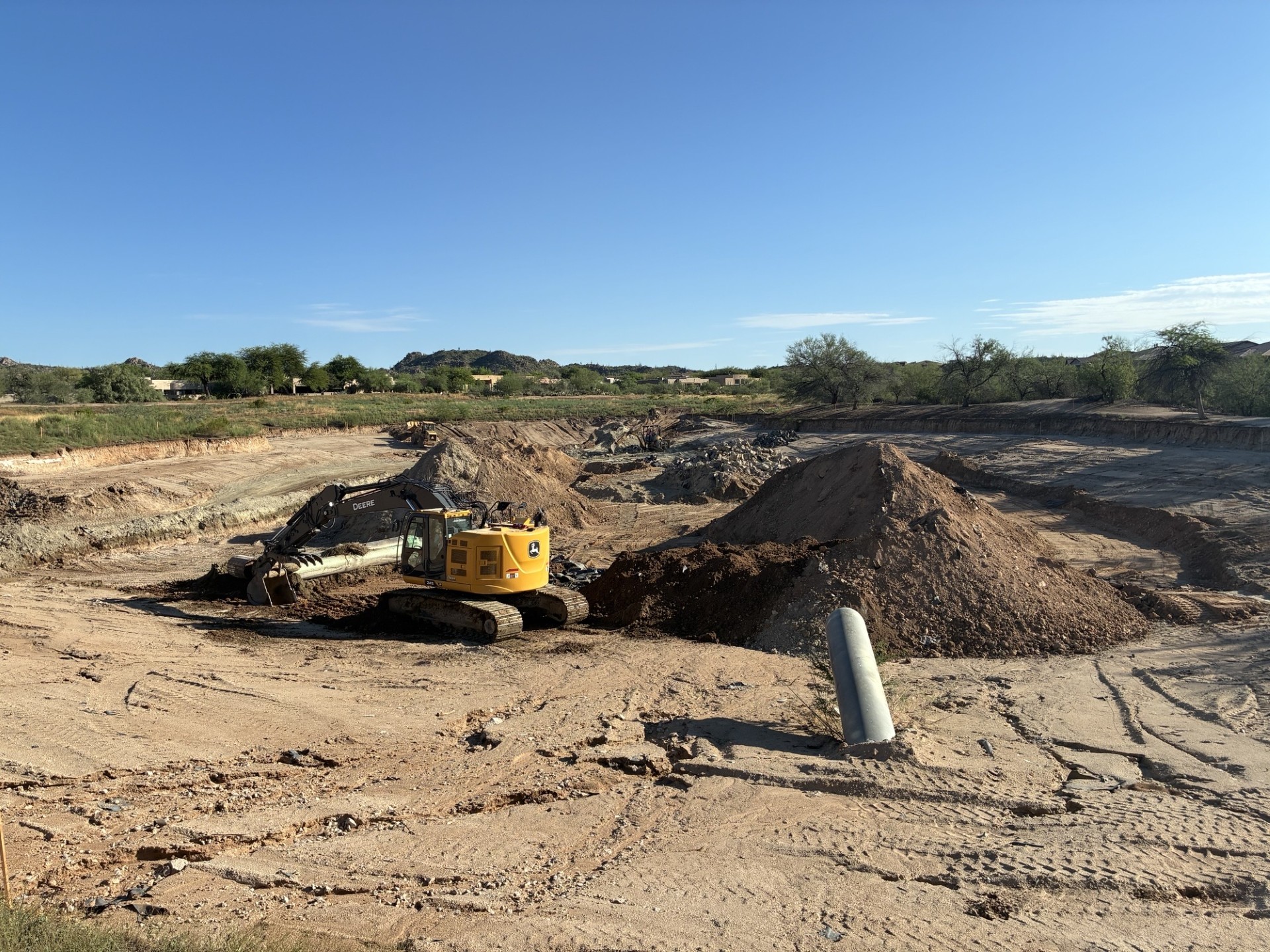 Excavation at the bottom of the pond